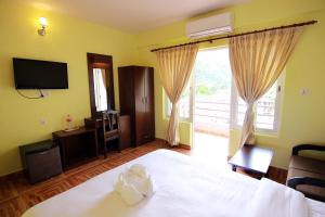 My Hotel Pvt Ltd tesisinde bir odada yatak veya yataklar
