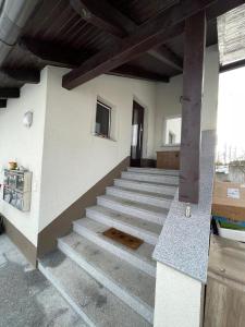 a stairway in a building with a stair case at Beim Wiesbau‘r in Pichl bei Wels