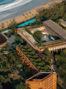 an aerial view of a building next to the beach at Desa Potato Head Bali in Seminyak