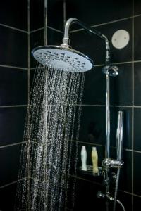 A bathroom at The Landmark Suites