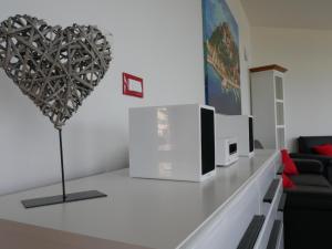 TV a/nebo společenská místnost v ubytování Villa Paradise