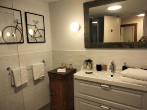a bathroom with a sink and a mirror at Maison Jacquemin in Saint-Pierre +44 photos