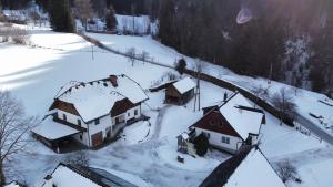 an aerial view of a village covered in snow at Ferienhaus Julia in Admont