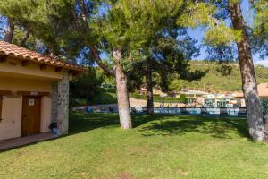 En have udenfor Camping-Bungalows Altomira