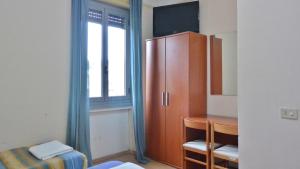 TV a/nebo společenská místnost v ubytování Hotel Arno