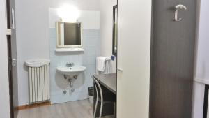 Koupelna v ubytování Hotel Arno