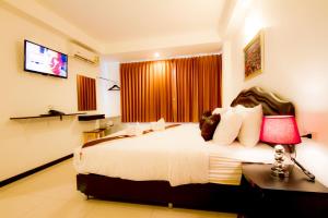TV a/nebo společenská místnost v ubytování TH beach hotel