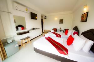Postel nebo postele na pokoji v ubytování TH beach hotel