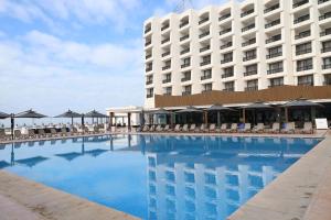 a large swimming pool in front of a hotel at Royal Mirage Agadir in Agadir