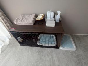 a dog crate with its doors open on a table at Star Seven Itoshima in Itoshima +30 photos