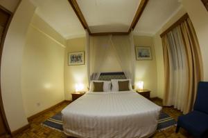 Postel nebo postele na pokoji v ubytování Hillpark Hotel + 37 fotografií