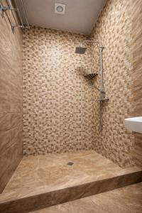a bathroom with a shower and a sink at Urban Nest old Tbilisi hotel in Tbilisi City +41 photos