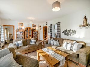 a living room with couches and a coffee table at 2 Bed in Dunkineely oc-ii05062 in Dunkineely
