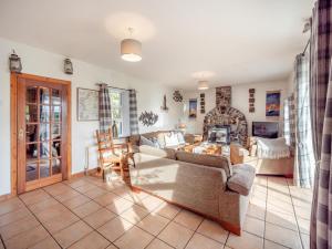 a living room with a couch and a fireplace at 2 Bed in Dunkineely oc-ii05062 in Dunkineely