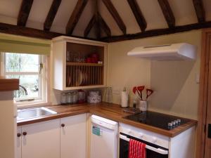 a kitchen with a sink and a counter top at 1 Bed in Ashford oc-bt064 in Biddenden +11 photos