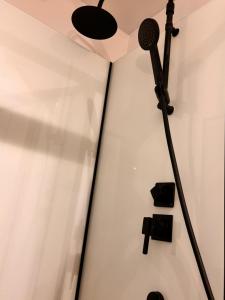 a room with a microphone on a wall at Le Clair-Obscur in Paray-le-Monial +33 photos