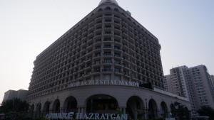 a tall building with a sign on the front of it at lucknowi stay in Lucknow