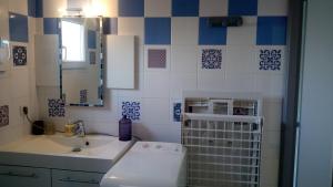 a bathroom with a sink and a mirror at Les Clés Nature in Moutiers-sous-Chantemerle +101 photos