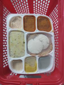 a plastic container filled with different types of food at 3BHK - Bamboo Private Pool Villa Yercaud in Yercaud