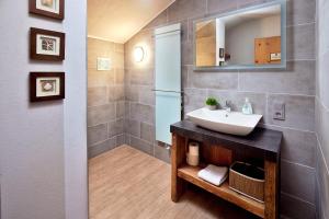 a bathroom with a sink and a mirror at APARTMENT SONNBLICK, Kaprun, Salzburg - inklusive Sommerkarte in Kaprun +52 photos