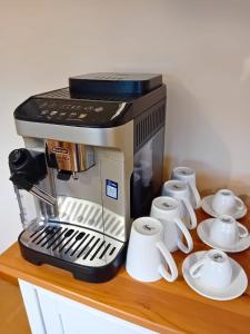 a coffee maker sitting on top of a counter at Deveron Lodge B&B in Turriff