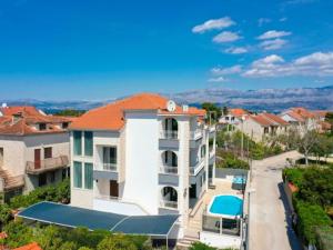 an aerial view of a building in a city at Villa Supe in Supetar