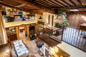 an overhead view of a living room with a staircase at Antica Filanda Sunshine in Arezzo