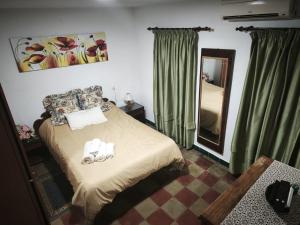 Llit o llits en una habitació de Alborada Dos
