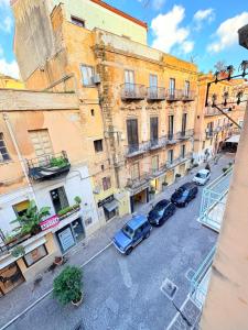 an aerial view of cars parked on a city street at M&S Home in Agrigento