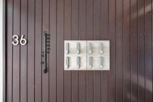 an overhead view of a metal building with a number at Ramoni Apartments - NaturTraum Kniebis in Freudenstadt