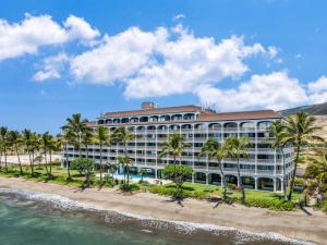 an aerial view of a hotel on the beach at Aloha Oceanfront Retreat 327 in Lahaina