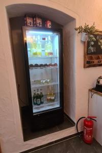 a refrigerator filled with lots of drinks at Apartment Kraxler Pärchen by Interhome in Weißenstadt
