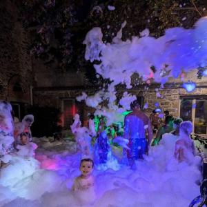 a group of people playing in an ice castle at Aloha Camping Club in Reynès +34 photos