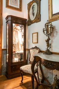 a room with a table and a chair and a cabinet at Casa Celestino in Santa Cruz de la Palma