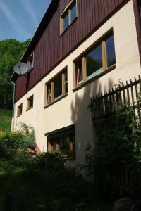 a building with a fence in front of it at Apartment Bergnest by Interhome in Bad Gottleuba