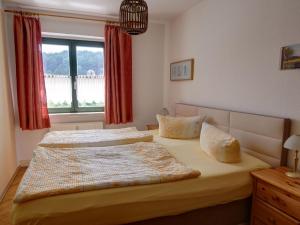 a bedroom with two beds and a window at Apartment Bastei by Interhome in Kurort Rathen