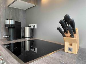 a kitchen with a counter with a coffee maker at Apartment Annika by Interhome in Hückeswagen