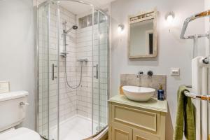 a bathroom with a shower and a sink at 3 Bed in Trellech oc-j34206 in Trelleck +39 photos