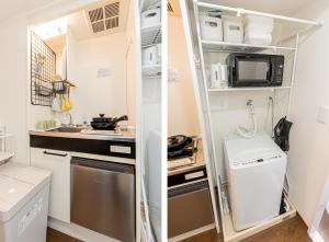 eine kleine Küche mit Spüle und Kühlschrank in der Unterkunft sakura 501 in Tokio + 14 Fotos