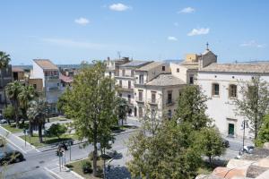 a view of a city street with buildings at Renna's in Grammichele