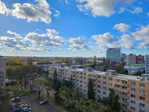 a view of a city with buildings and cars at LAM Design Greenery AC - Balcony in Bratislava