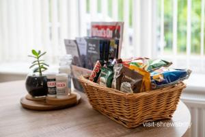 a basket sitting on top of a table at Personal En-suite in Shrewsbury