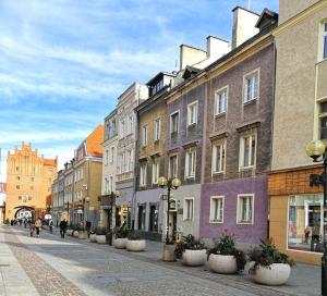 a row of buildings on a city street at STARE MiASTO II in Olsztyn