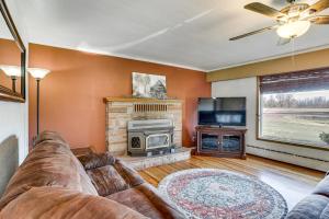 a living room with a couch and a fireplace at Secluded Albany Escape, Pet Friendly w/ Fee in Albany