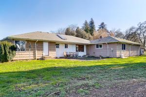 a house with a lawn in front of it at Secluded Albany Escape, Pet Friendly w/ Fee in Albany