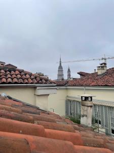 a view of the roofs of a building at Casa Ferrara in Novara