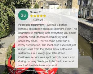a sign that is next to a body of water at Spinners View - NEW Renovated Apartment - Central Skipton & Parking in Skipton