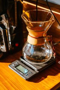 a glass blender sitting on top of a table at AMANI Casa Suite in San Rafael