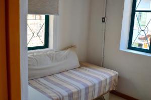 A bed or beds in a room at Casa igba