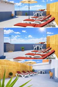 a room with red and white chairs and an umbrella at Alma Del Sur Tenerife in Arona